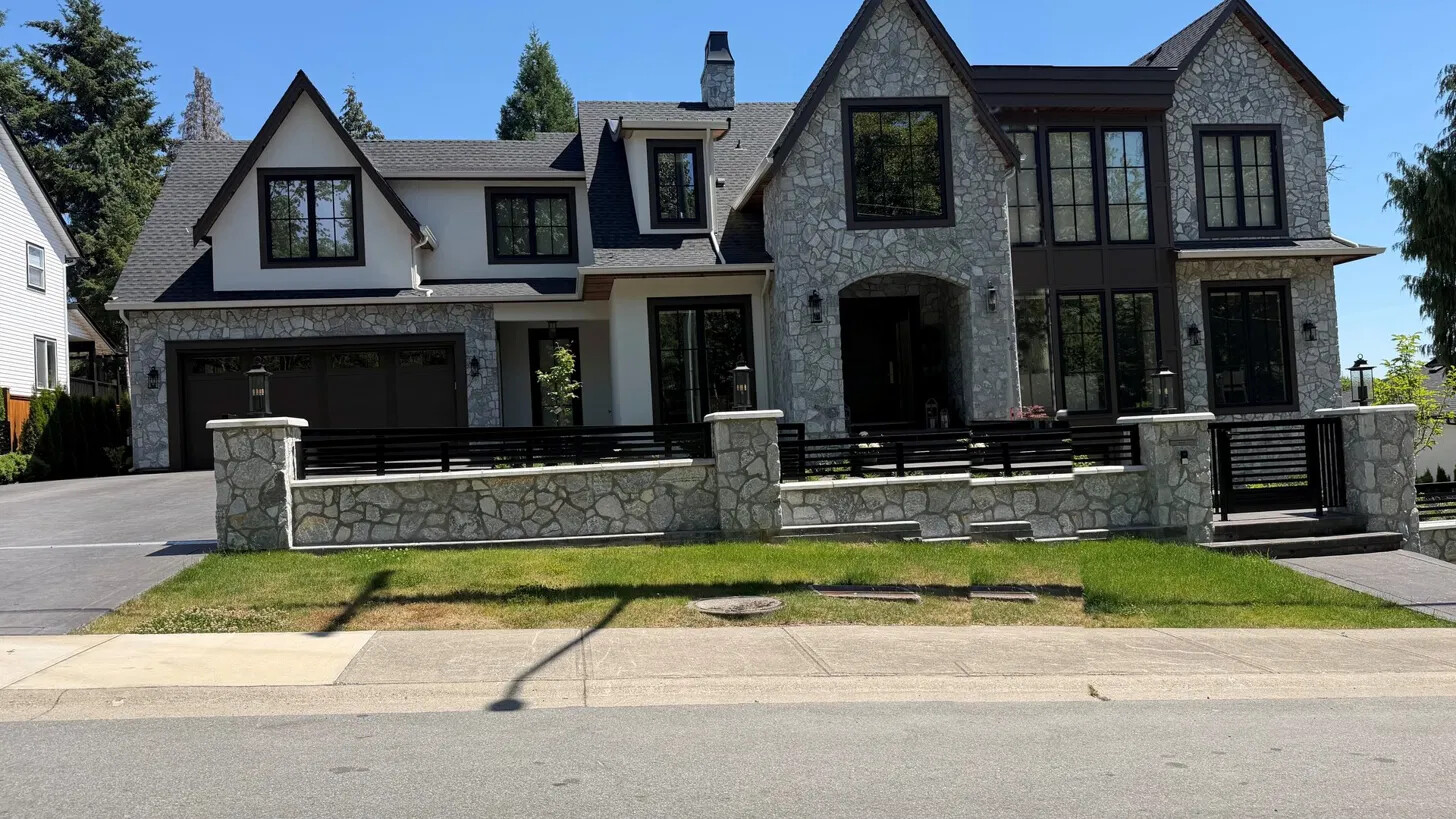 A custom stone-and-stucco detached home in Surrey, BC